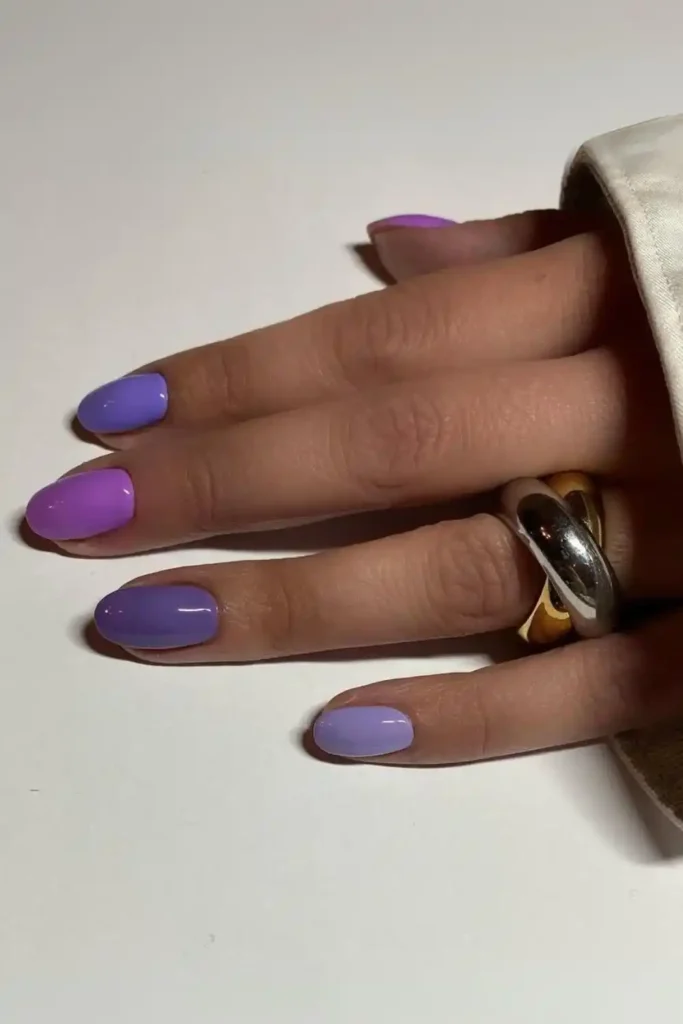 Skittle Nails in Different Shades of Purple for a Fun Colorful Look