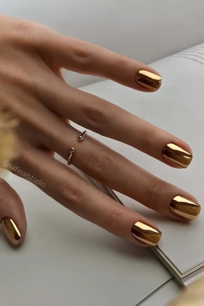 Solid Gold Chrome Manicure With a Sleek Mirror Shine