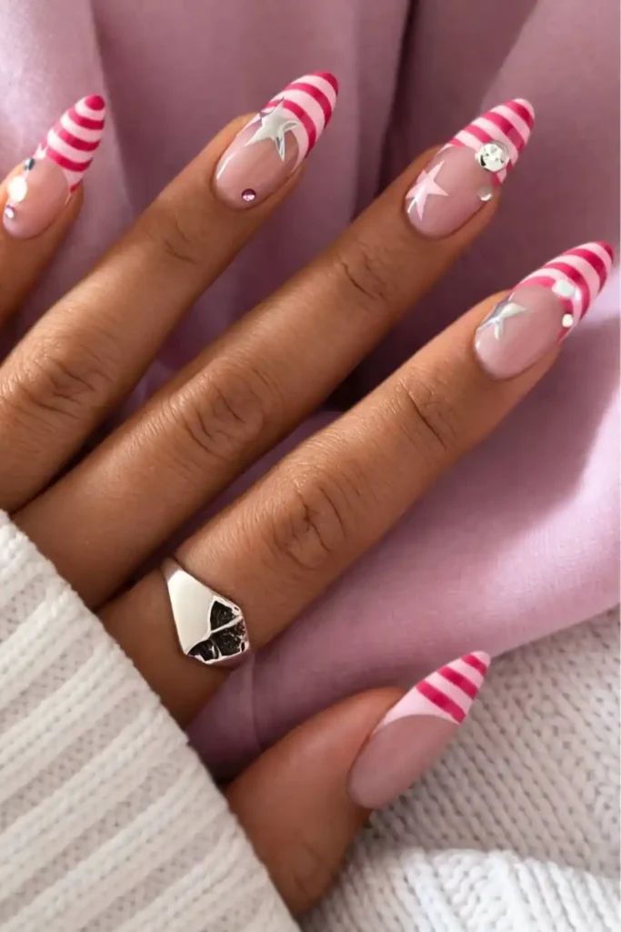 Striped Pink French Nails With Stars and Gems That Sparkle Beautifully