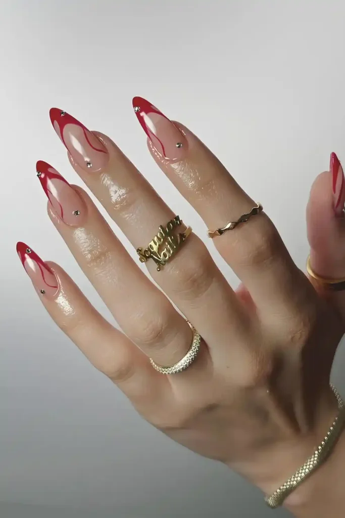 Swirly Red French Tip Mani With an Artistic Modern Twist