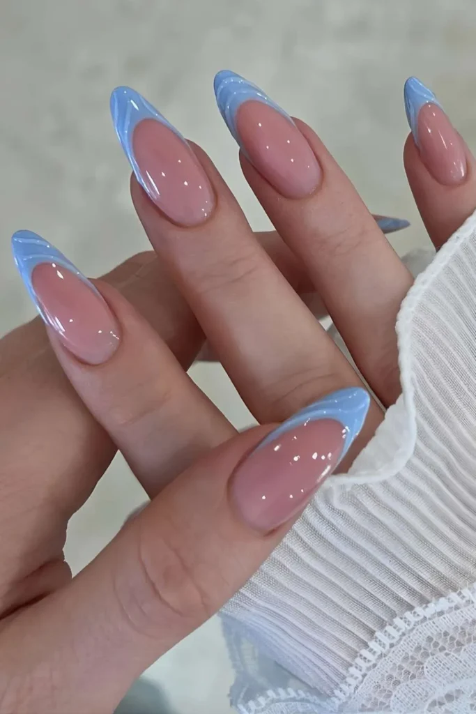 Textured Blue French Tip Manicure With a Unique Artistic Touch