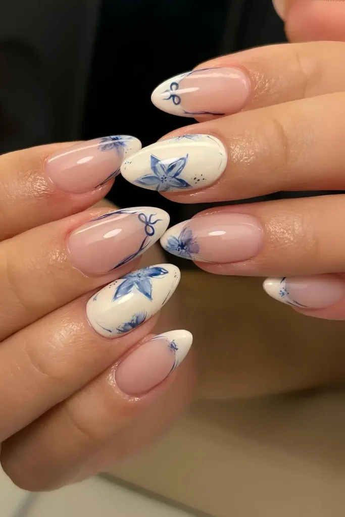 Vanilla Nails With Blue Flowers and Bows