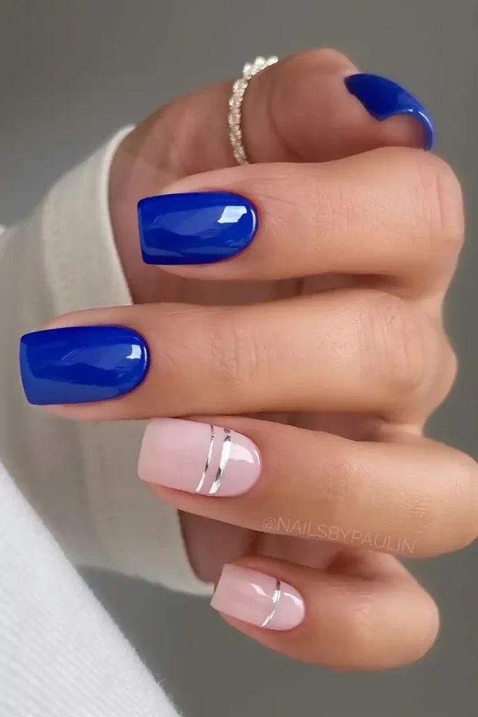 Vibrant Blue Nails With Silver Stripe Art for a Sleek Contemporary Style