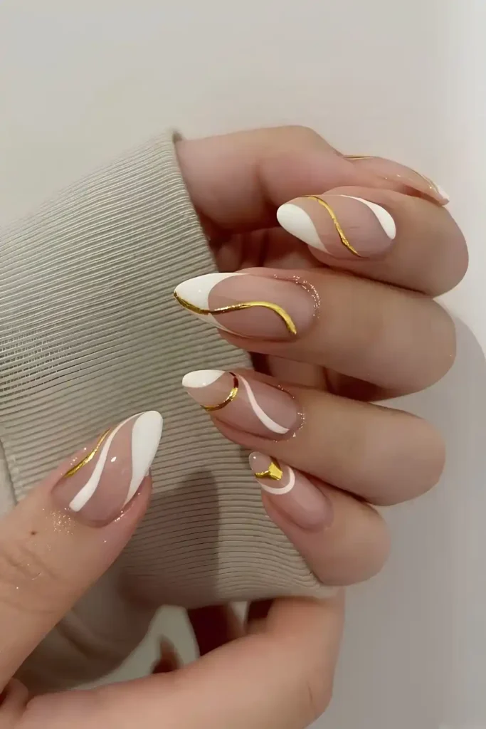 White French Mani With Gold Swirls for a Sophisticated Finish