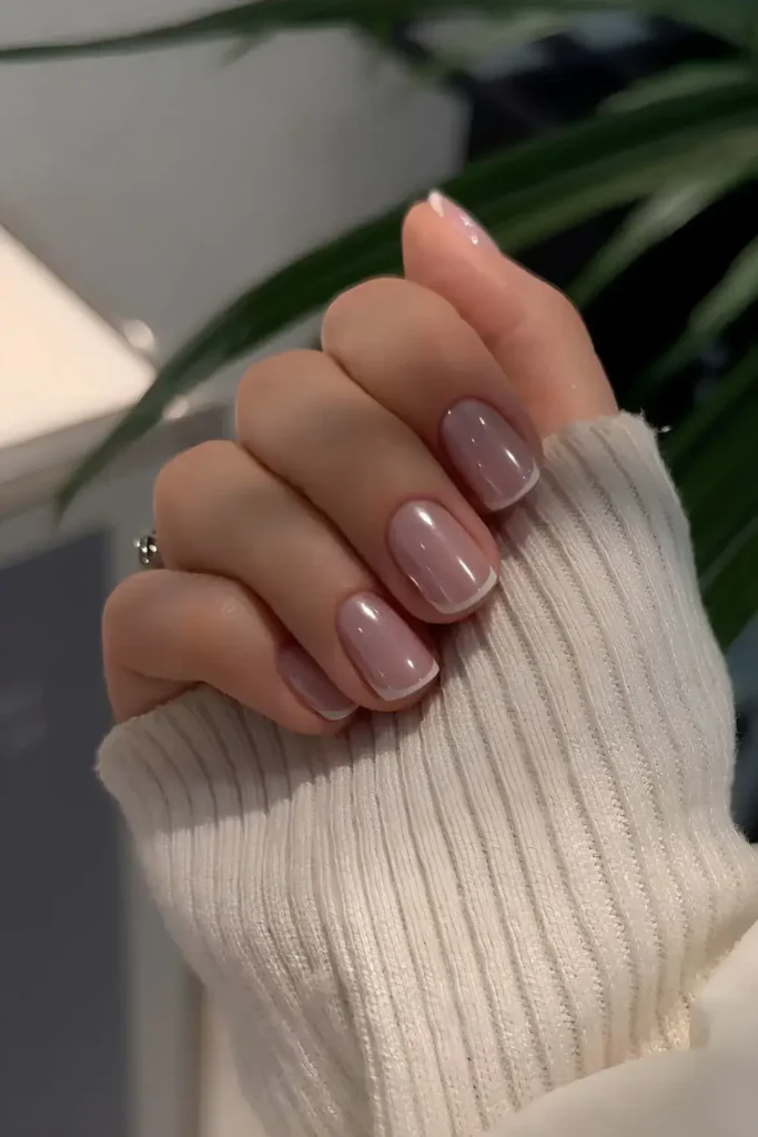 White French Nails on a Purple Base for a Bold Modern Twist