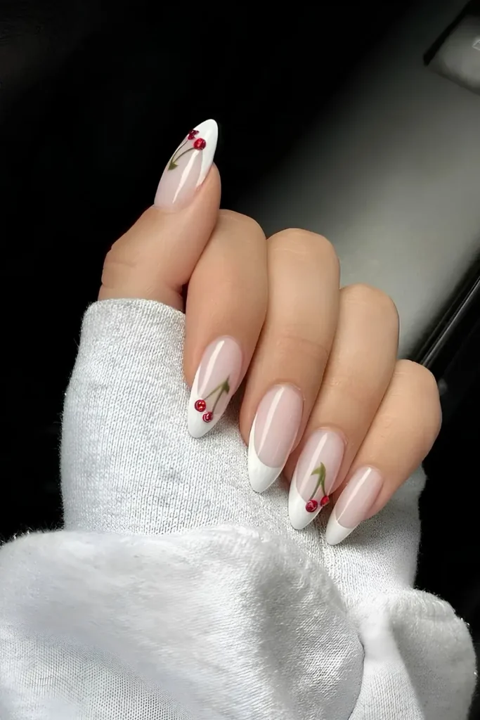 White French Nails With Cherry Accents for a Sweet Playful Touch