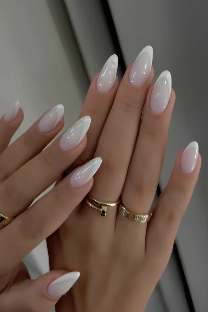 White Ombre Mani With Gems and French Tip Outlines That Shine Beautifully