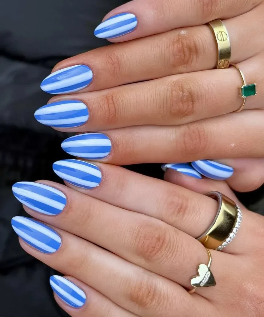 White and Blue Striped Manicure With a Classic Coastal Vibe