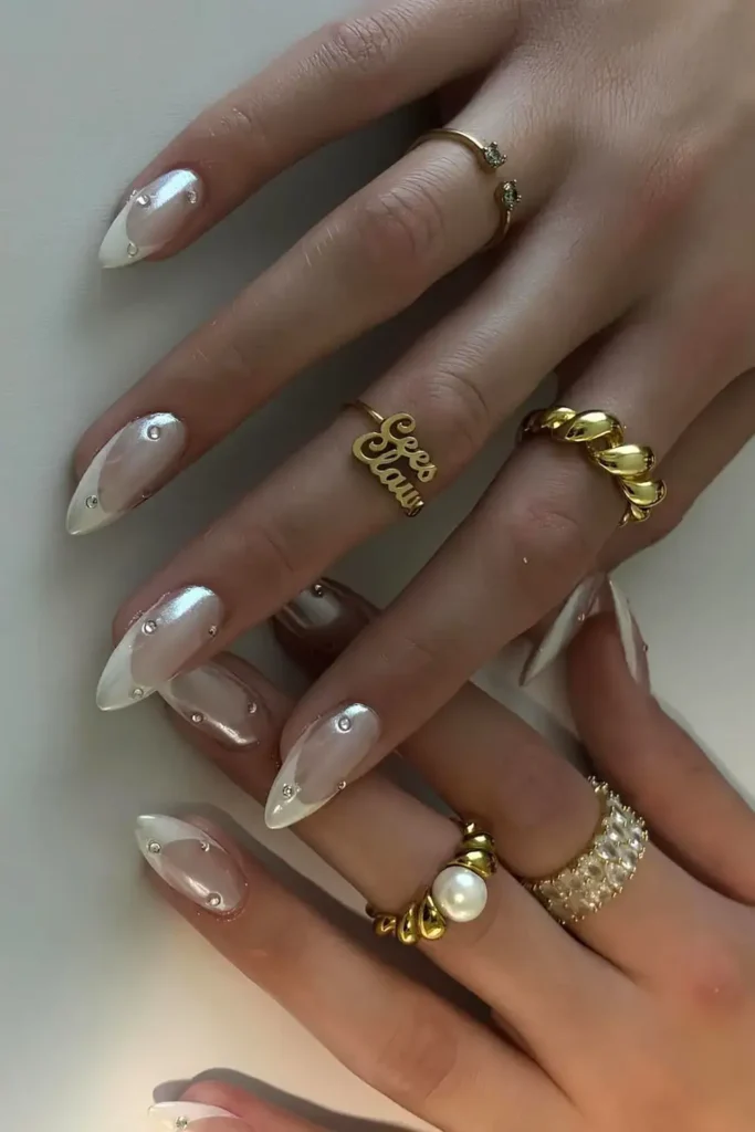 White Chrome French Nails With Rhinestones for a Glam Look