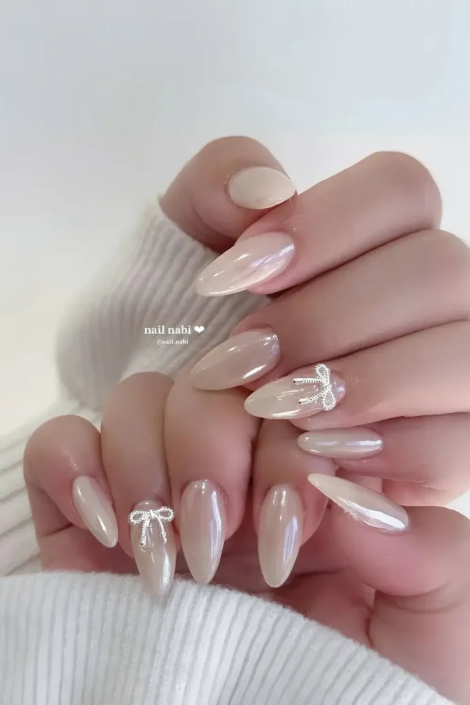 White Chrome Nails With 3D Bows for a Cute Look