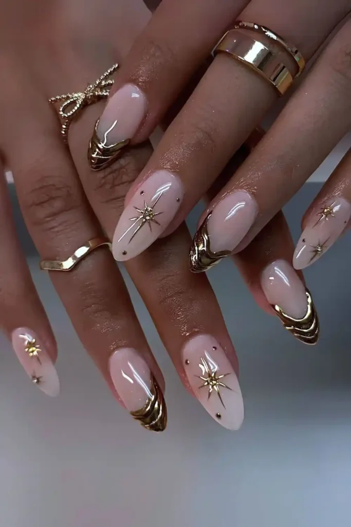 White Mani With Gold Chrome Drip and Starbursts That Make a Statement