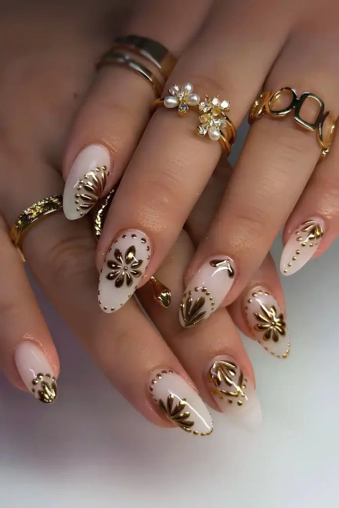 White Nails With Gold Chrome Flower Art That Shine Beautifully