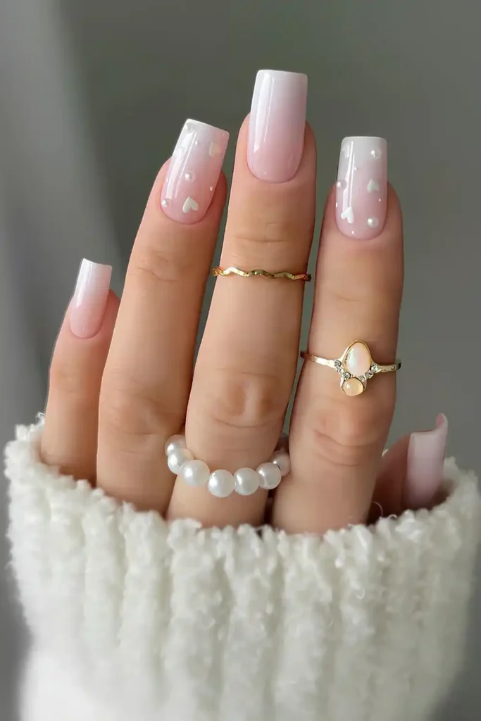 White Ombre Manicure With Pearls and Hearts That Looks Delicate