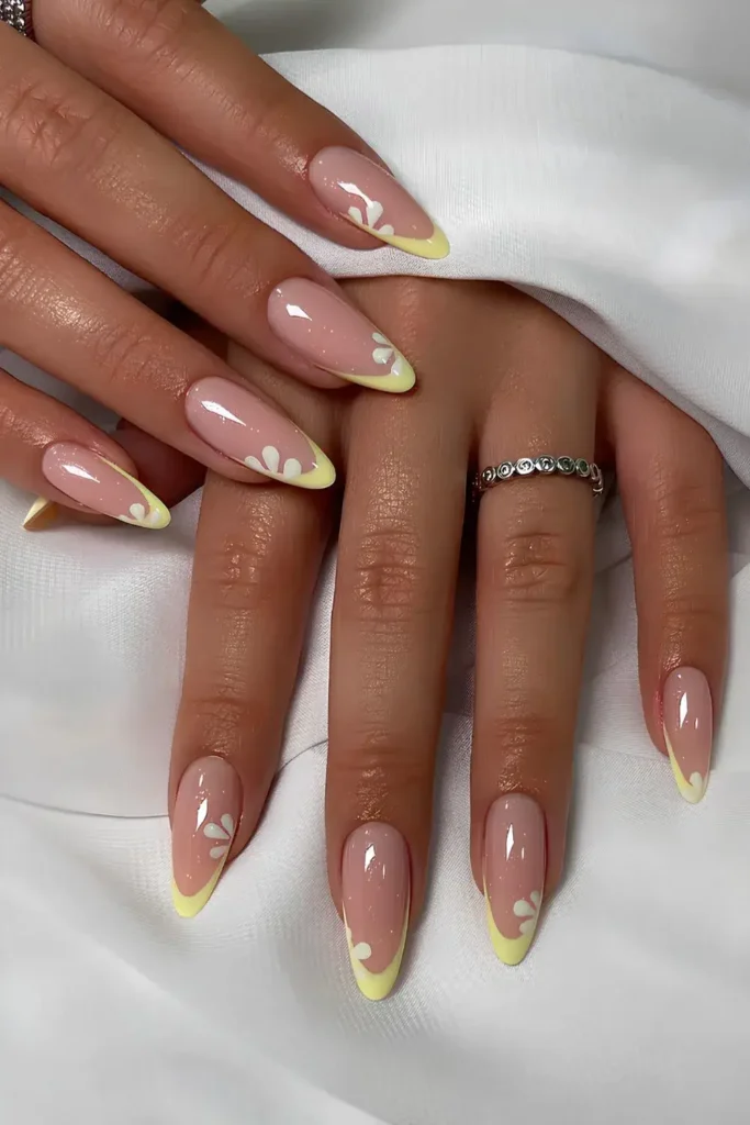 Yellow French Tip Nails With Daisies for a Cheerful Look