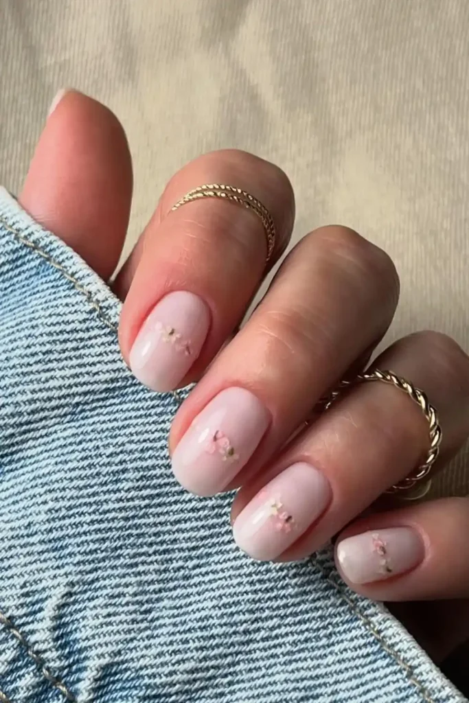 Floral Details on Soft Pink Base for a Delicate Feminine Look