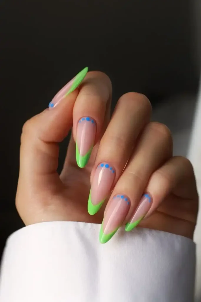 Neon Green French Tips With Blue Dots for a Fun Twist