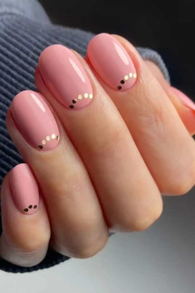 Nude Pink and Golden Dot Half Moon Nails for an Elegant Finish